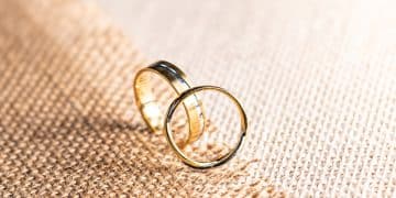 silver ring on brown textile